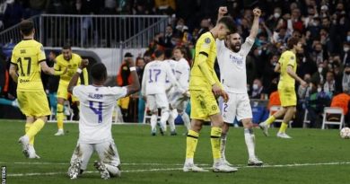 Real Madrid players celebrate their while Chelsea players lick wound